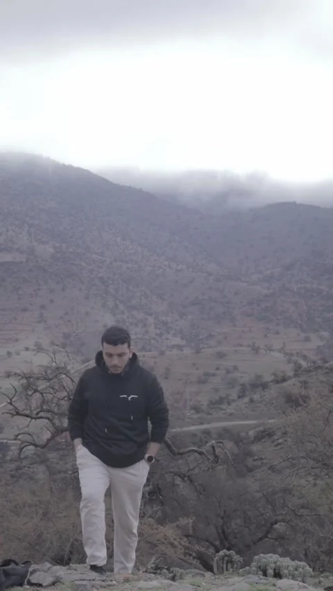 Young Man Portrait in Dramatic Ait Issafen Mountains Morocco Stock Footage 332776512