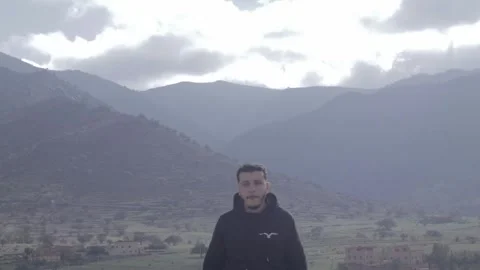 Young Man Portrait in Dramatic Ait Issafen Mountains Morocco Stock Footage 332776566