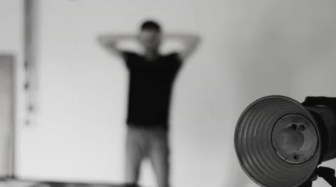 Young man posing for the camera in the studio Vidéo 68408689