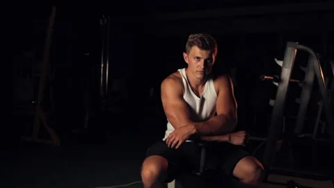 Young man posing in gym Stock Footage