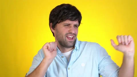 Young man posing isolated on yellow background studio. People lifestyle concept Stock-Footage 145654469