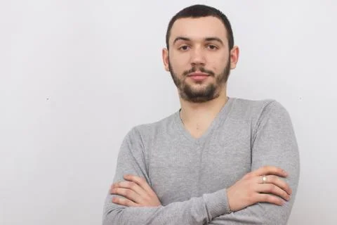 Young man posing on light background. Mock up Stock Photos