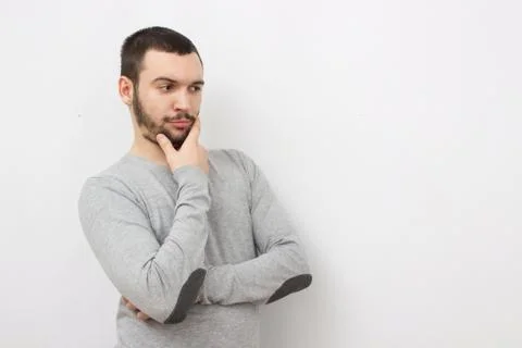 Young man posing on light background. Mock up Stock Photos