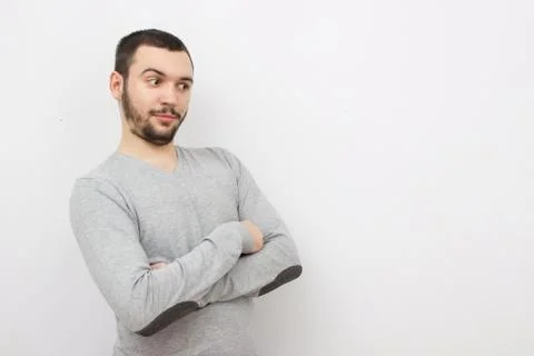 Young man posing on light background. Mock up Stock Photos