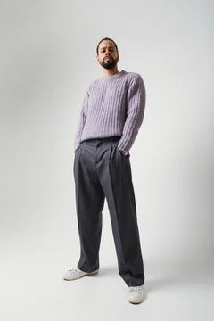 Young man, posing in the studio. Mind set and mental health. Vertical. Stockfoto's
