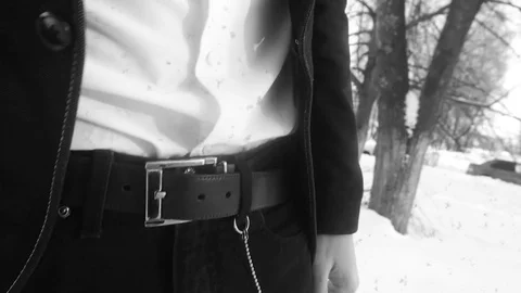 Young man posing in a tuxedo in the winter against the white snow,shot in retro Stock-Footage 85071024