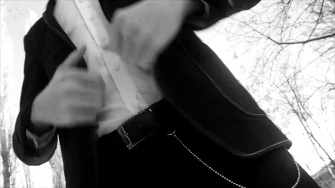 Young man posing in a tuxedo in the winter against the white snow,shooting Stock Footage 85075979
