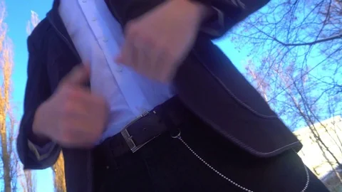 Young man posing in a tuxedo in the winter against the white snow Video stock 85137179
