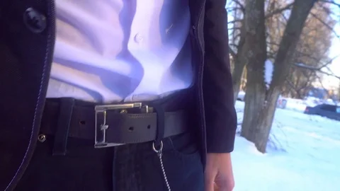 Young man posing in a tuxedo in the winter against the white snow Stock Footage 85139737