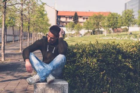 Young  man posing in an urban context Stock Photos