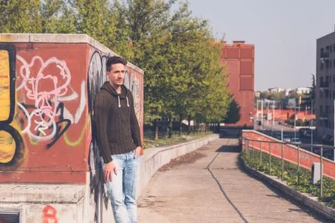 Young  man posing in an urban context Stock Photos