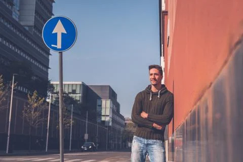 Young  man posing in an urban context Stock Photos