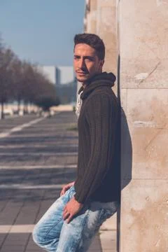 Young  man posing in an urban context Stock Photos