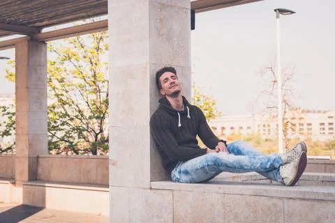 Young  man posing in an urban context Stock Photos