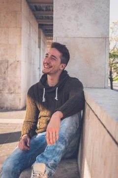 Young  man posing in an urban context Stock Photos