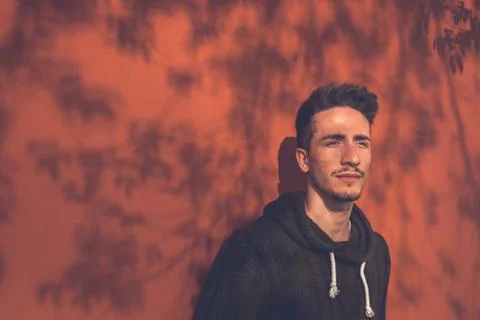 Young  man posing in an urban context Stock Photos