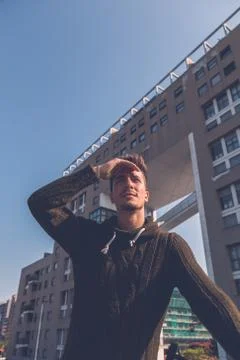 Young  man posing in an urban context Stock Photos