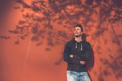 Young  man posing in an urban context Stock Photos