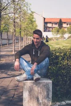 Young  man posing in an urban context Stock Photos