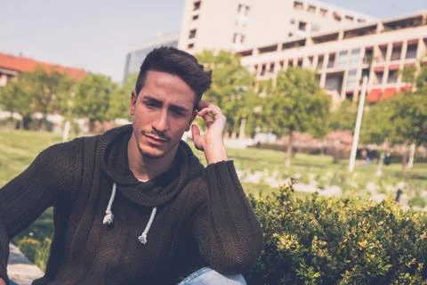 Young  man posing in an urban context Stock Photos