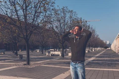 Young  man posing in an urban context Stock Photos