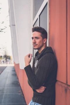 Young  man posing in an urban context Stock Photos