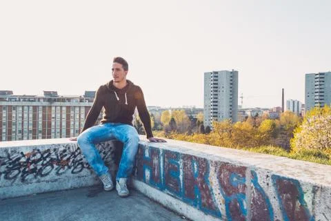 Young  man posing in an urban context Stock Photos