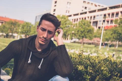 Young  man posing in an urban context Stock Photos