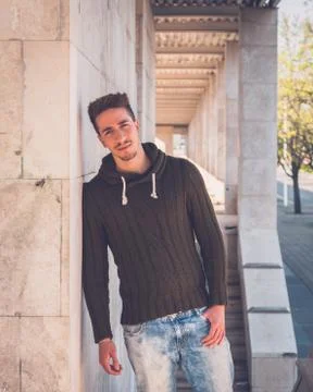 Young  man posing in an urban context Stock Photos