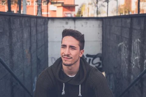 Young  man posing in an urban context Stock Photos