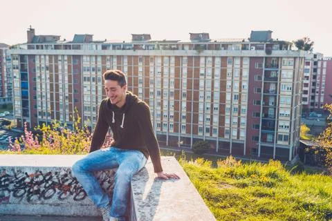 Young  man posing in an urban context Stock Photos
