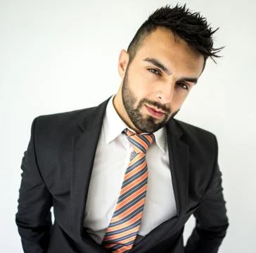 Young man posing on white background Stock Photos