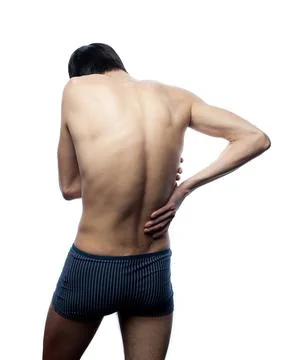 Young man posing on white background Stock Photos