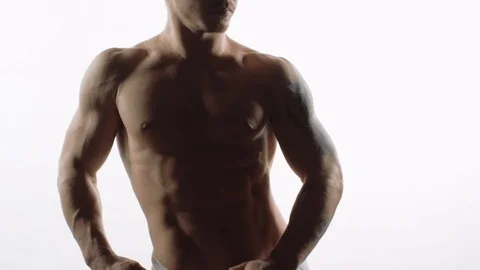 Young Man Is Posing. White Room. Stock Footage 107442700