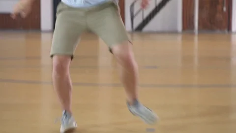 Young man practices with soccer ball Stock Footage 79238589