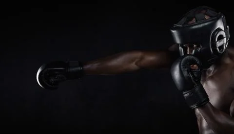 Young man practicing boxing Stock-Fotos