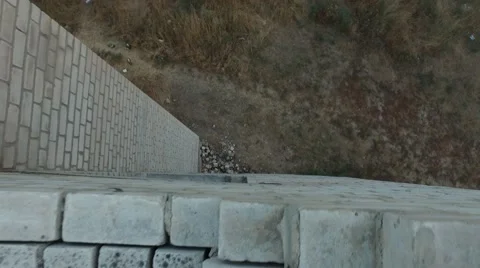 Young man practicing flips and jumps at the roof of building Stock Footage 67315107
