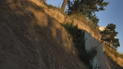 A young man practicing freestyle BMX in BMX park at dusk Stock-Footage 94965843