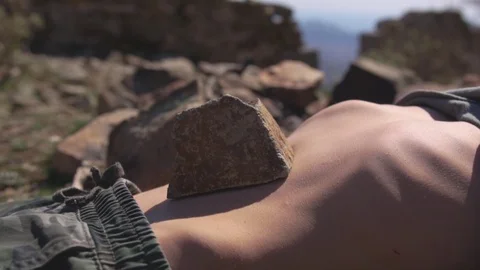 Young man practicing the movement of the abdomen nauli yoga technique Stock Footage 124526121