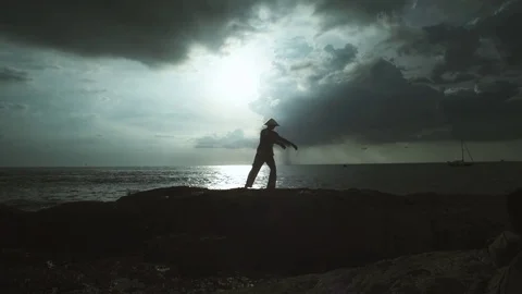 Young Man Practicing Performs Tai Chi Moves Stock Footage 70805473