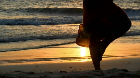 Young man practicing relaxation exercises by the sea Stock Footage 94127200
