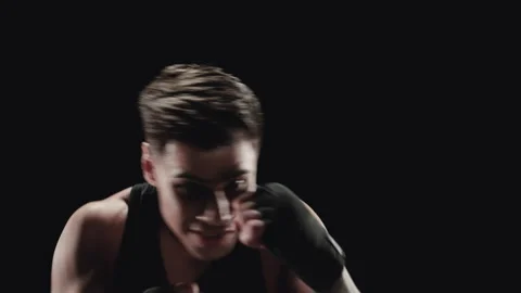 Young man practicing shadow boxing Stock Footage 152116289