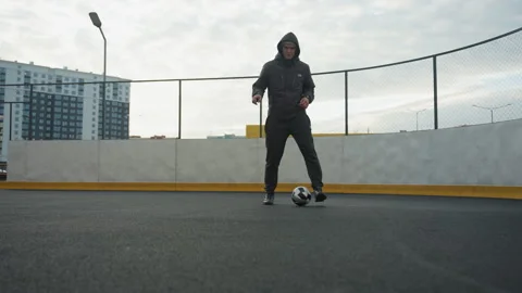Young Man Practicing Soccer Drills on Urban Sports Arena Stock Footage 301796114