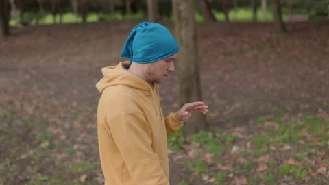 Young man practicing tai chi in park Stock Footage 316834997