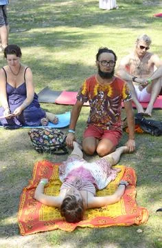 Young man practicing Thai massage during festival of Yoga and Vedic Culture Stock Photos