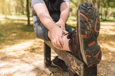 Young man practising stretching exercises for the sports championship. athlete Stock Photos