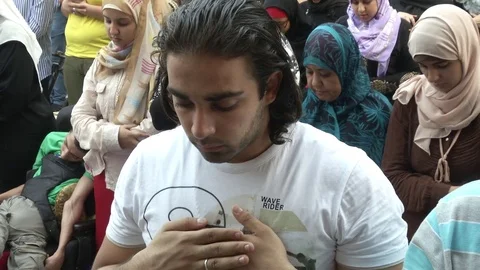 Young man praying in Cairo Egypt Video stock 82312011