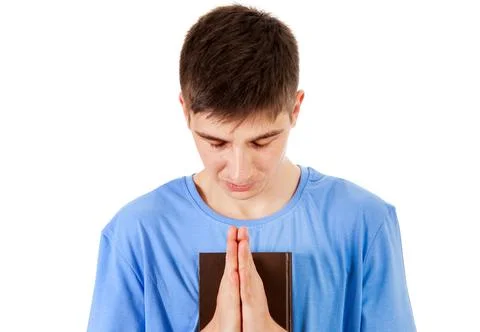 Young Man praying Stock Photos
