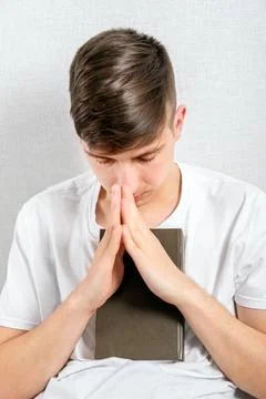 Young Man is praying Stock Photos