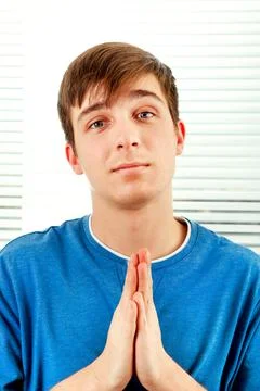 Young Man praying Stock Photos